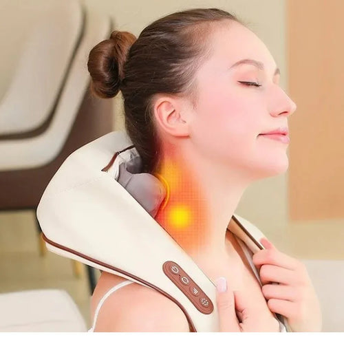 Woman relaxing with the Evenwarm cordless heated neck and shoulder massager draped over her shoulders